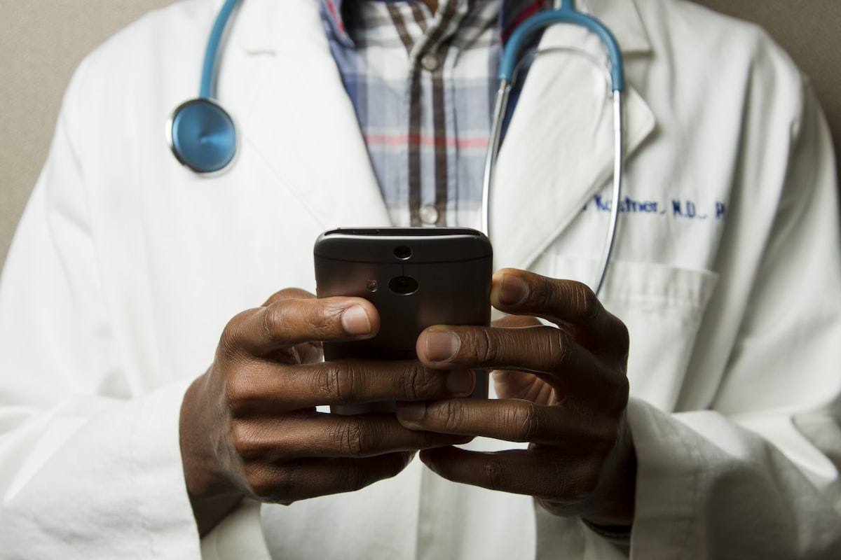 Hospital digital transformation 2026 — doctor using healthcare technology for paperless hospital operations